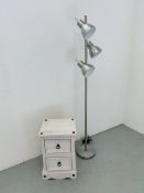 A DESIGNER BRUSHED STEEL FLOOR STANDING ANGLE POISE LAMP AND MODERN LIMED FINISH TWO DRAWER CHEST.