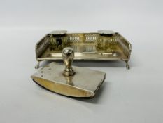 A silver ink standish with silver topped ink bottles and blotter (the blotter by a different maker),