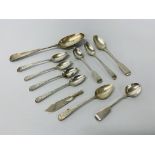 An early C18th silver dessert spoon (A/F), three bright cut silver Georgian teaspoons,