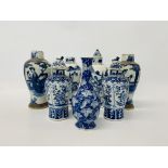 A pair of Chinese blue and white baluster vases decorated with figures,