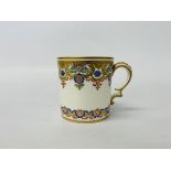 A sèvres small mug decorated with pendant fruit and profusely gilded,