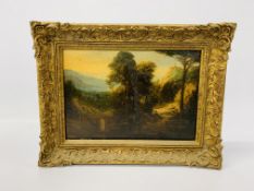 C19th European School: Figure seated in a wooded landscape, oil on panel,