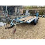 A TWIN AXEL FLAT BED FARM TRAILER - L 360cm. W 166cm. FOR RESTORATION.