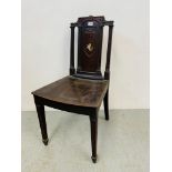 A George III mahogany hall chair,