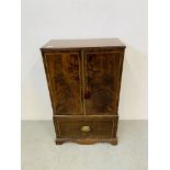 A mahogany two door cupboard with drawer below, made from old materials, height 91.