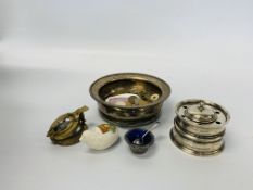 A SILVER INKWELL, A SMALL PIERCED SILVER POT WITH BLUE GLASS LINER, A SILVER PLATED WINE COASTER,