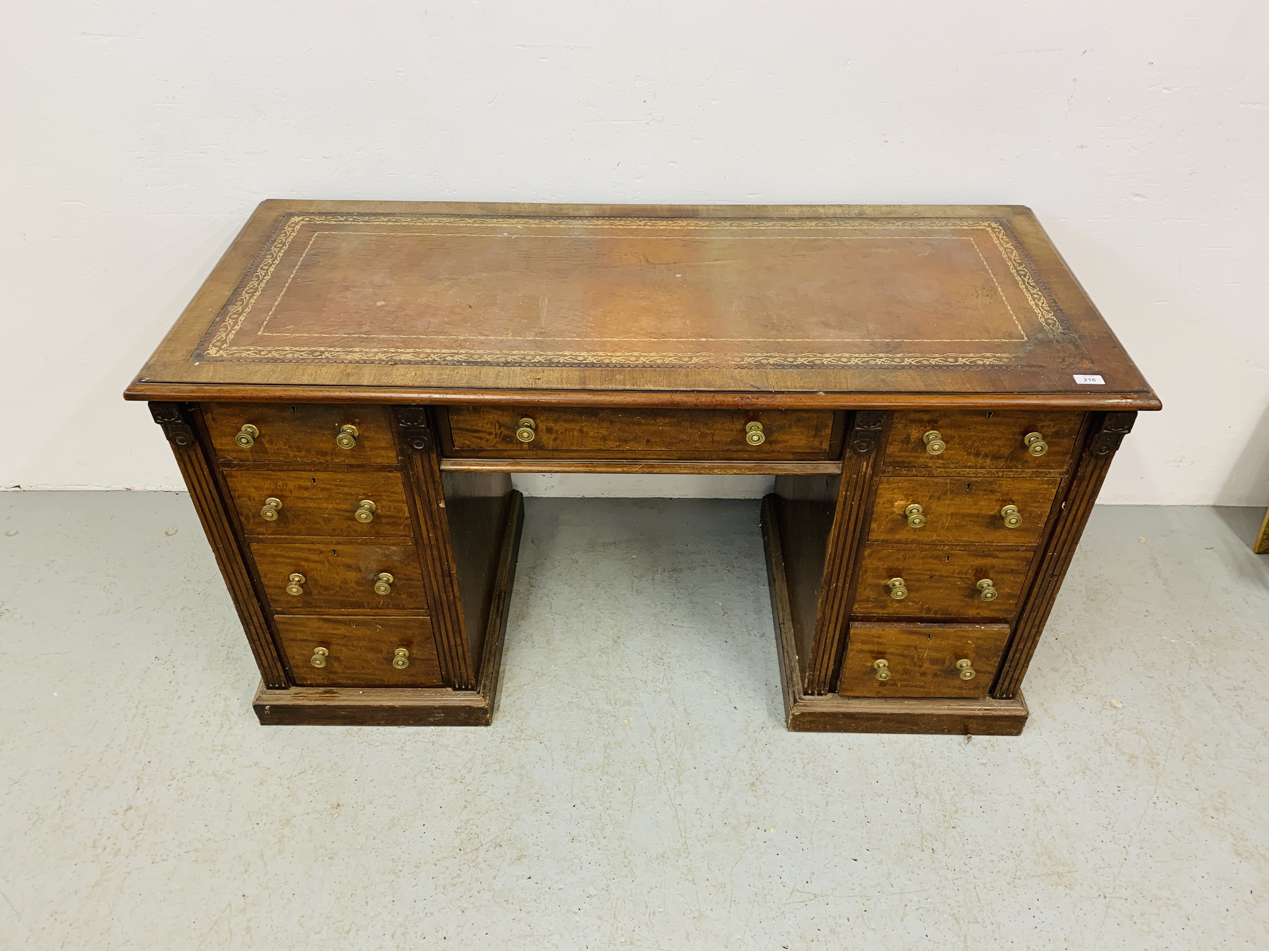 An Edwardian mahogany single piece nine drawer pedestal desk with inlaid tan leather top, - Image 2 of 18