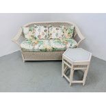 A WICKER AND CANE CONSERVATORY SOFA AND CANE HEXAGONAL OCCASIONAL TABLE