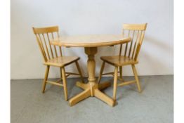 A SOLID BEECHWOOD PEDESTAL BREAKFAST DINING SET