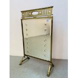 AN ANTIQUE BRASS AND MIRRORED FIRE SCREEN - W 46CM. H 77CM.