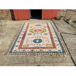 A GOOD QUALITY HANDMADE TURKISH WOOL CARPET WITH TRADITIONAL PATTERNED DESIGN 333CM X 237CM