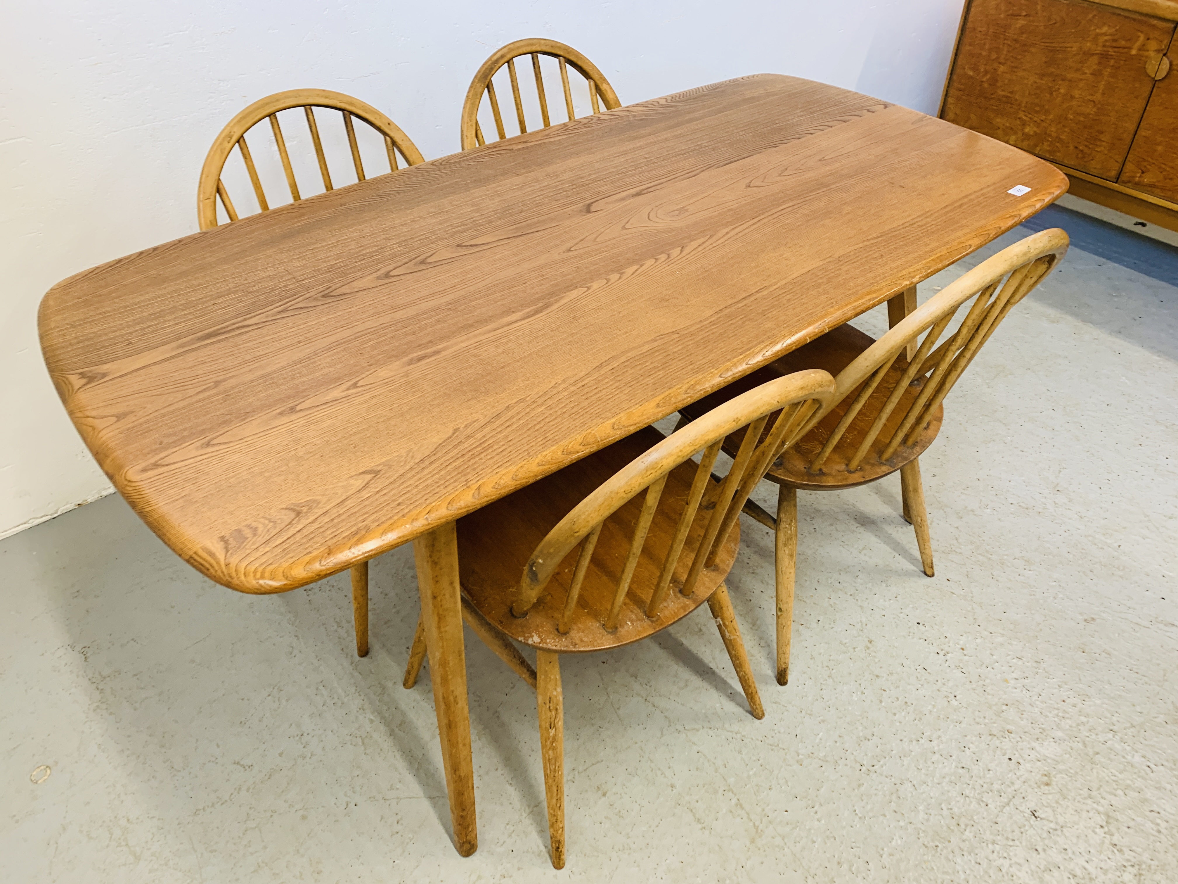 AN ERCOL ELM RECTANGULAR DINING TABLE 153CM X 77CM ALONG WITH A SET OF FOUR ERCOL STICK BACK DINING - Image 3 of 9