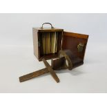 AN ANTIQUE BOX CONTAINING VARIOUS STEREOSCOPE SLIDES ALONG WITH STEREOSCOPE VIEWER