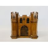 A C19TH OAK GENTLEMAN'S TABLE CABINET OF CASTELLATED FORM,