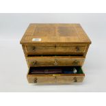 A QUALITY REPRODUCTION WALNUT TWO DRAWER JEWELLERY CHEST WITH HINGED TOP CONTAINING A FITTED TRAY