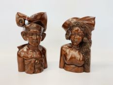 A PAIR OF MODERN ORIENTAL CARVED HARDWOOD BUSTS, A MAN AND A WOMAN, HEIGHTS 29CM AND 26.