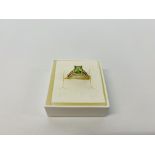 A 9CT GOLD PERIDOT DRESS RING