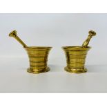 TWO GEORGIAN BRASS PESTLE AND MORTARS, ONE STAMPED TURNER & CO.