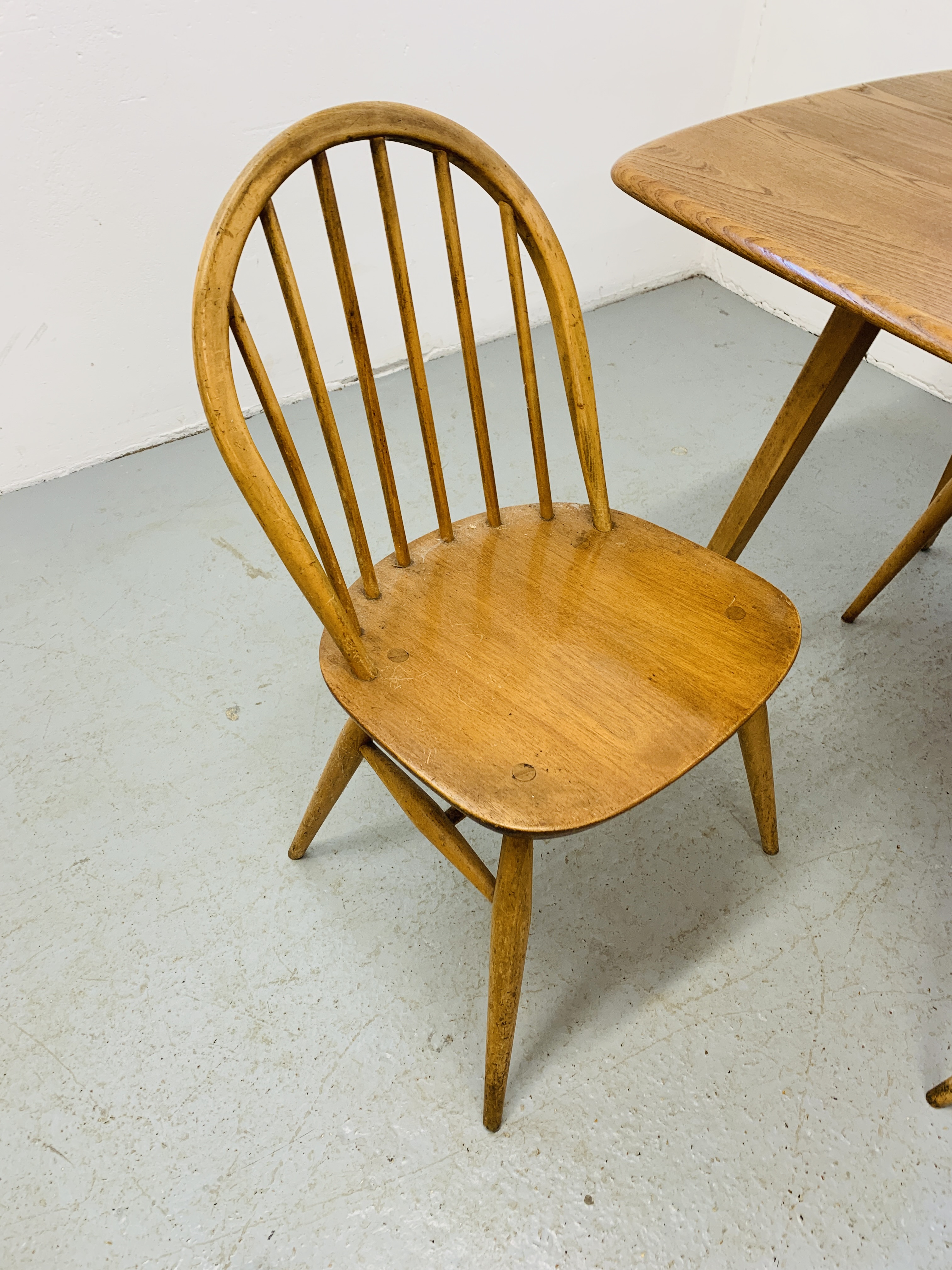 AN ERCOL ELM RECTANGULAR DINING TABLE 153CM X 77CM ALONG WITH A SET OF FOUR ERCOL STICK BACK DINING - Image 9 of 9