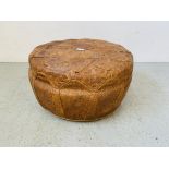A REAL TAN LEATHER POUFFE WITH EMBOSSED DECORATION