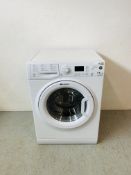 A HOTPOINT AQUARIUS A CLASS WASHING MACHINE - MODEL WDPG 8640 - SOLD AS SEEN