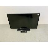 A PANASONIC 43 INCH SMART TV MODEL TX43FX55B (REMOTE WITH AUCTIONEER) - SOLD AS SEEN