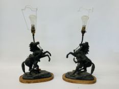 A PAIR OF ANTIQUE SPELTER TABLE LAMPS IN THE FORM OF A REARING HORSE - SOLD AS SEEN