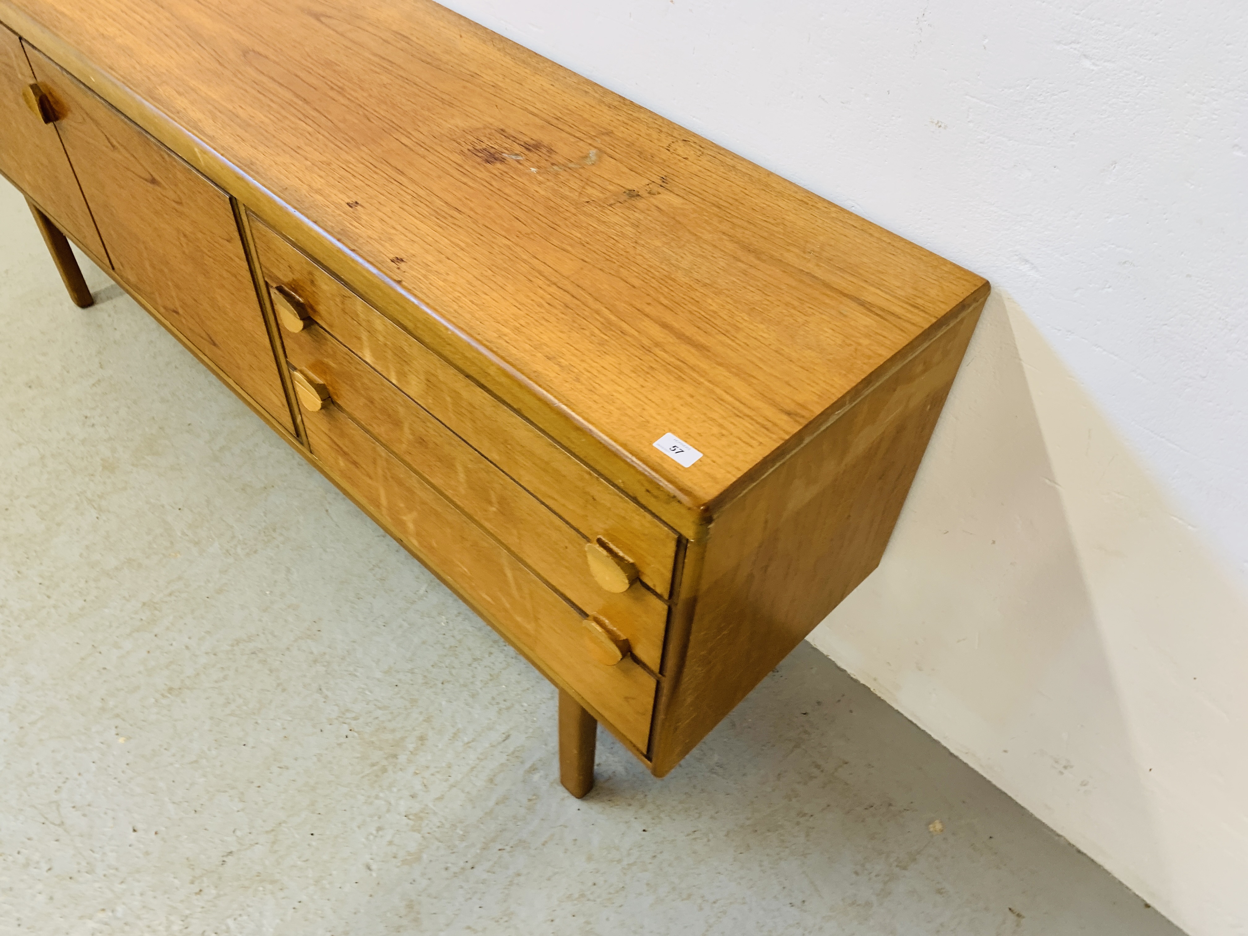 A RETRO TEAK FINISH SIDEBOARD WITH THREE DRAWERS AND TWO CABINET DOORS - LENGTH 184CM. DEPTH 45CM. - Image 5 of 13