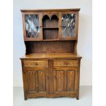 AN OAK OLD CHARM STYLE TRADITIONAL DRESSER - W 115CM. H 179CM. D 45CM.