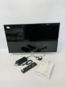 A SONY BRAVIA 32 INCH SMART TELEVISION MODEL KDL - 32W705B (REMOTE WITH AUCTIONEER) - SOLD AS SEEN