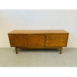 A RETRO TEAK FINISH SIDEBOARD WITH THREE DRAWERS AND TWO CABINET DOORS - LENGTH 184CM. DEPTH 45CM.