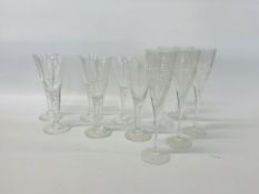 SET OF 6 HAND BLOWN WINE GLASSES TOGETHER WITH 5 CHAMPAGNE FLUTES BEARING LION MOTIF TO BASE