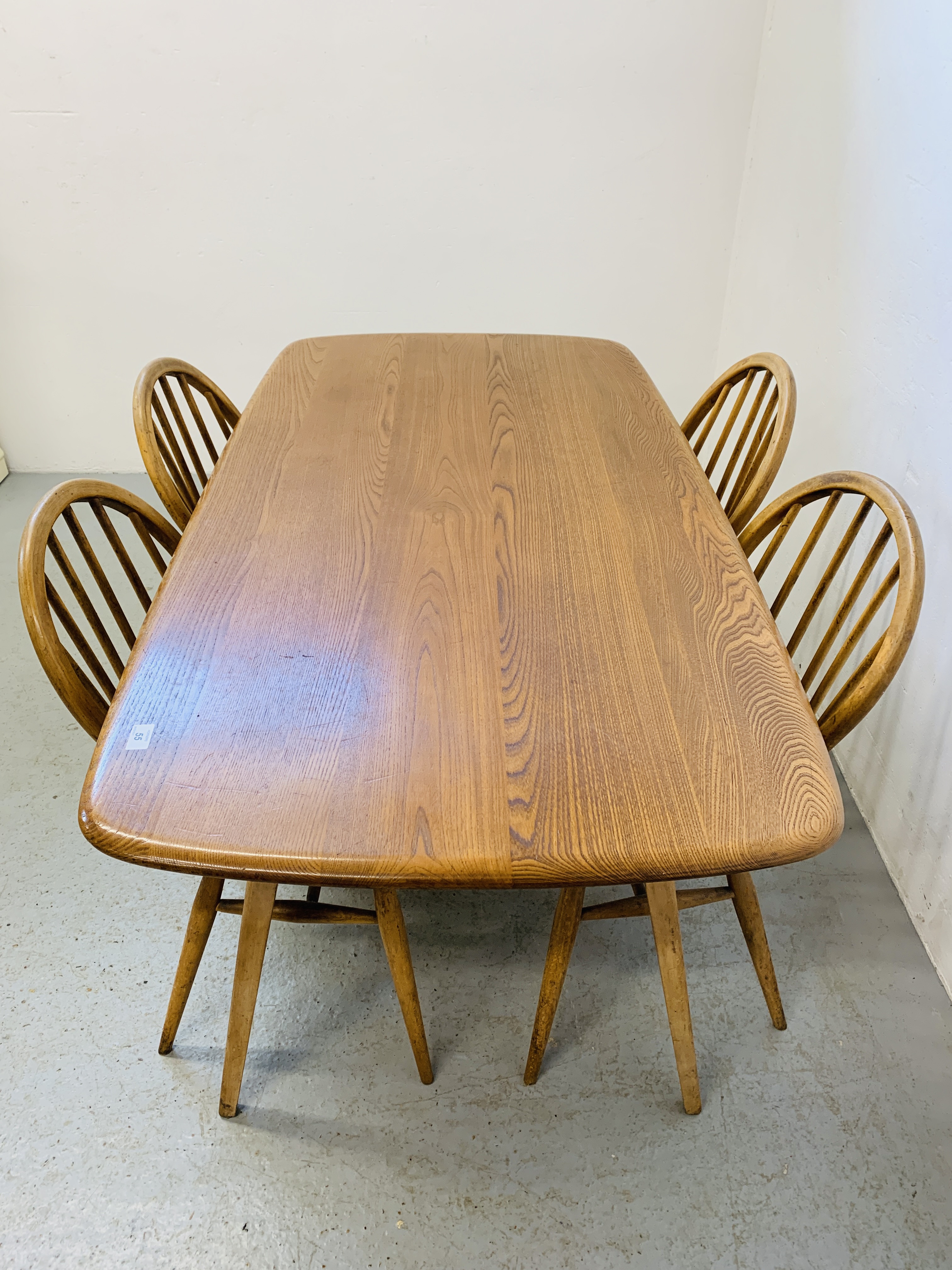 AN ERCOL ELM RECTANGULAR DINING TABLE 153CM X 77CM ALONG WITH A SET OF FOUR ERCOL STICK BACK DINING - Image 5 of 9