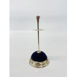 A SILVER HAT PIN STAND WITH AMETHYST FINIAL, WH, BIRMINGHAM 1910, HEIGHT 15CM.