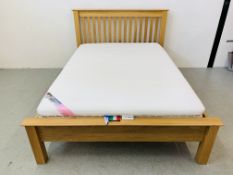 A MODERN LIGHT OAK DOUBLE BEDSTEAD WITH PERDORMIRE MEMORY FOAM MATTRESS