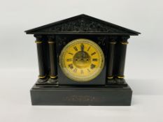 A SLATE MANTEL CLOCK WITH CORINTHIAN COLUMN DETAIL EXPOSED ESCAPEMENT THE MOVEMENT STRIKING ON A