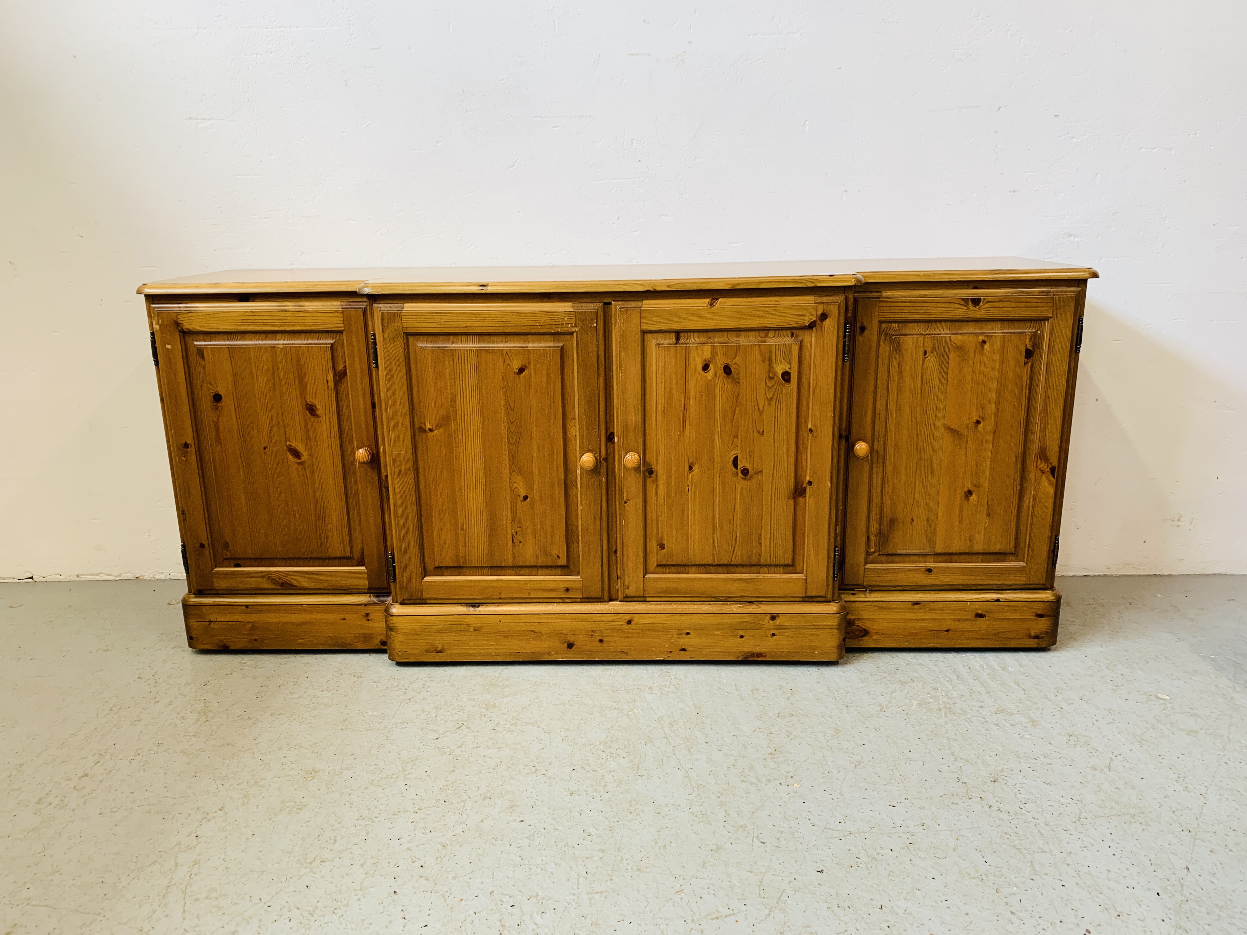 A DUCAL HONEY PINE BREAK FRONT FOUR DOOR DRESSER BASE - W 175 CM. D 46CM. H 75CM. - Image 3 of 9