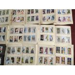 A COLLECTION OF CIGARETTE CARDS IN SEVENTEEN ALBUMS,