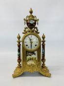 A CONTINENTAL BRASS CASED MANTEL TIME PIECE, THE MOVEMENT STRIKING ON A BELL - HEIGHT 41 CM.