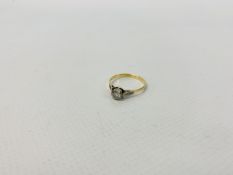 A SOLITAIRE DIAMOND RING MARKED 18CT