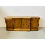 A DUCAL HONEY PINE BREAK FRONT FOUR DOOR DRESSER BASE - W 175 CM. D 46CM. H 75CM.