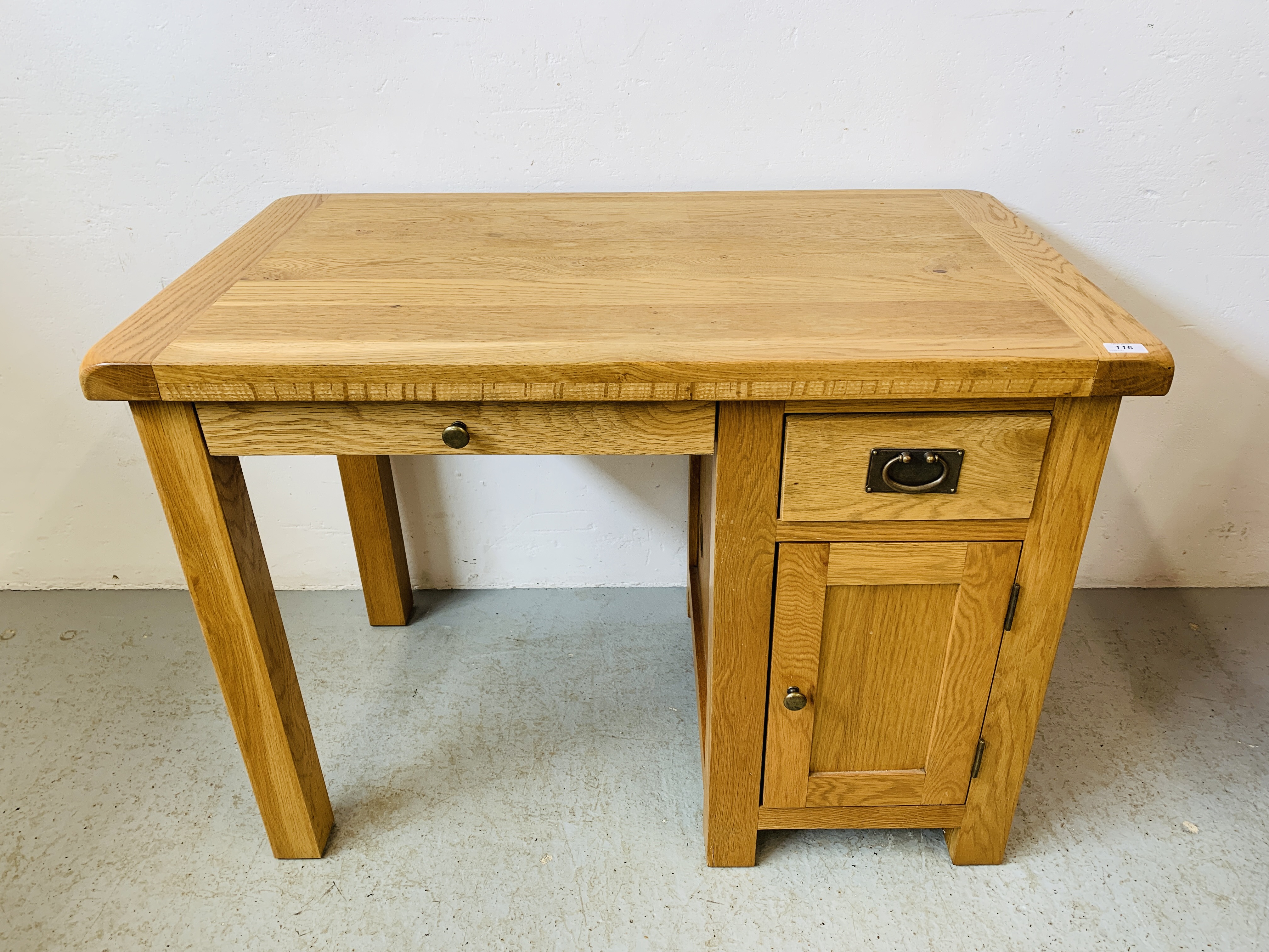 A MODERN LIGHT OAK SINGLE PEDESTAL COMPUTER DESK - W 110CM. D 65CM. H 80CM.