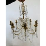 A PAIR OF MODERN FIVE BRANCH CHANDELIER LIGHT FITTINGS ALONG WITH LARGER EIGHT BRANCH CHANDELIER