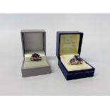 2 X SILVER DRESS RINGS, ONE SET WITH PURPLE STONE,