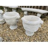 A PAIR OF STONEWORK GARDEN URN PLANTERS - HEIGHT 46 CM, DIAMETER 38 CM.