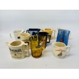 A COLLECTION OF 10 BAR TOP ADVERTISING WATER JUGS TO INCLUDE BRITVIC, TEACHERS, FAMOUS GROUSE,