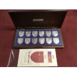 DANSBURY MINT "THE ROYAL ARMS" SILVER INGOT SET OF 12 IN PRESENTATION BOX, ISSUED IN 1977,