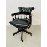 A BOTTLE GREEN BUTTON BACK LEATHER REVOLVING OFFICE CHAIR
