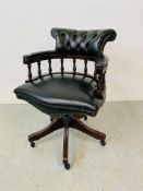 A BOTTLE GREEN BUTTON BACK LEATHER REVOLVING OFFICE CHAIR