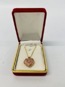 A 9CT ROSE GOLD HEART SHAPED "MUM" PENDANT NECKLACE